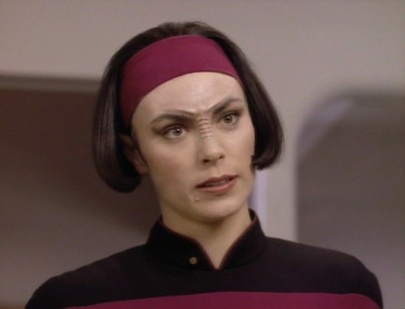 Ensign Ro. She was loud, didn't follow the rules, whined about not being able to wear her earring. What the heck was an ensign doing hanging around all the senior officers anyway. She needed to go. 